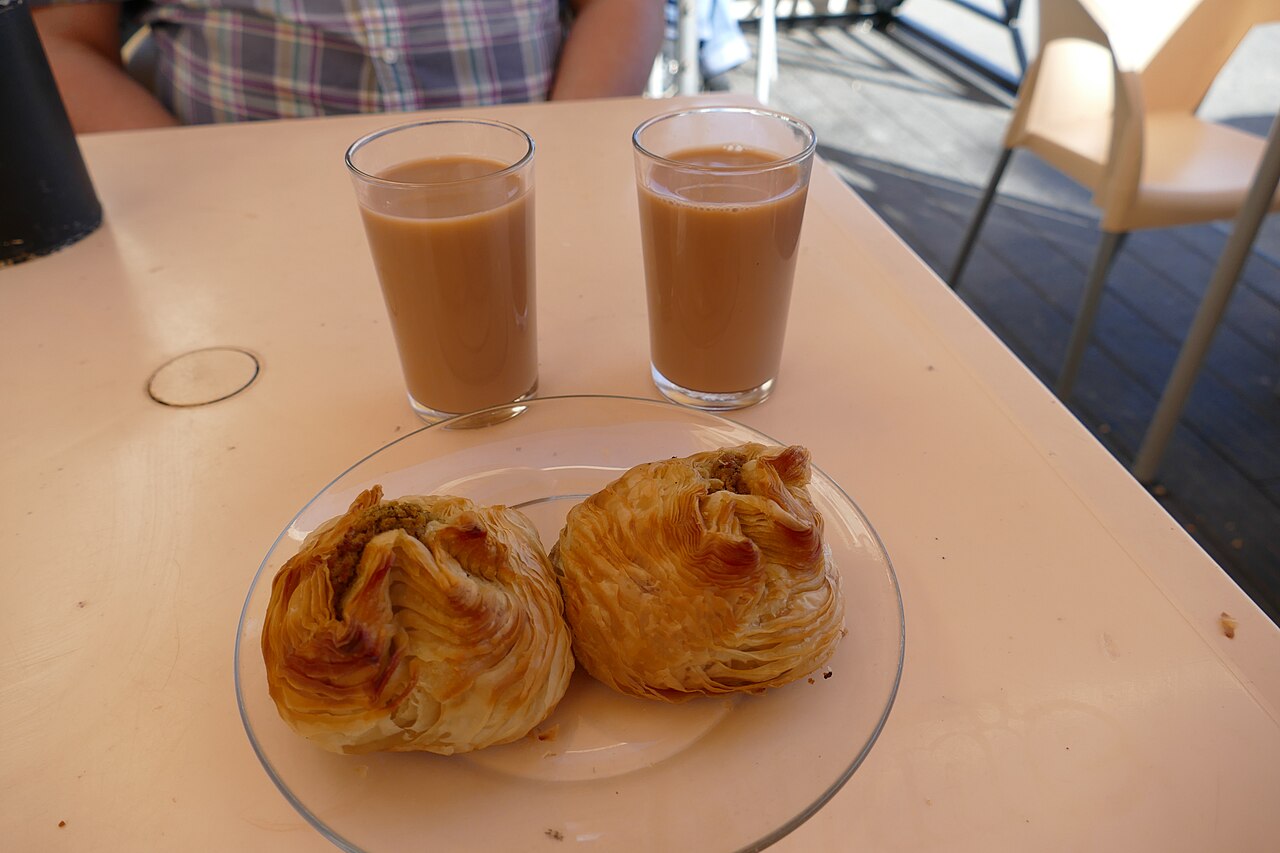 Qassatat and glasses of tea from a shop in Mdina